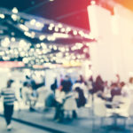 People at exhibition blurred